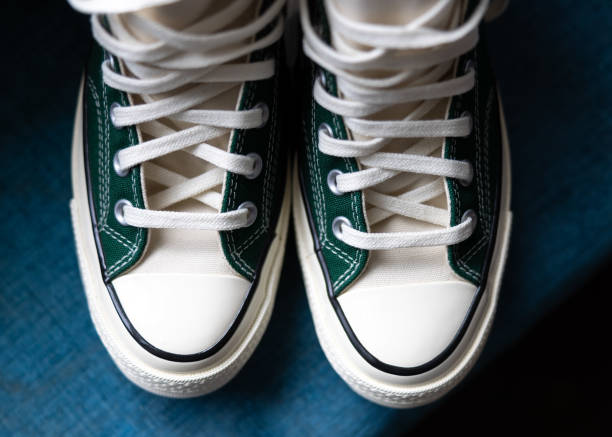 istock Cool retro wedding trainers with laces and rubber toe caps. 1962527609