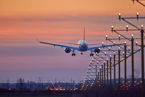 istock Passenger plane is landing during a wonderful sunset 1962533728