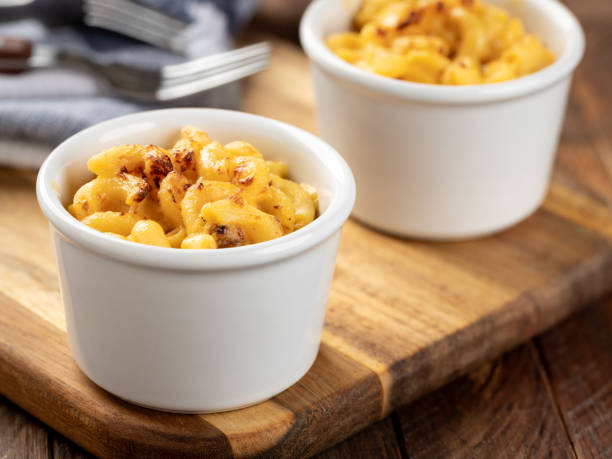 istock Baked macaroni and cheese in a white cuo 1962541040