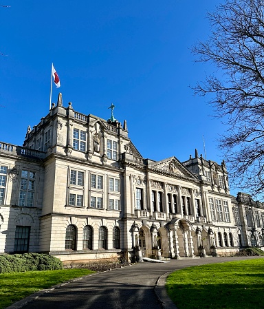 The main university building at Cardiff in Cathays park on a sunny blue sky day. The university is located in the capital city of Wales in the South of the country