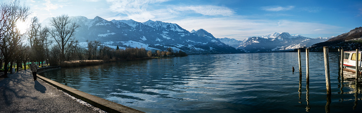 sarnen lake in switzerland fishing boat is on lake sunny day in winter season panoramic landscape still
