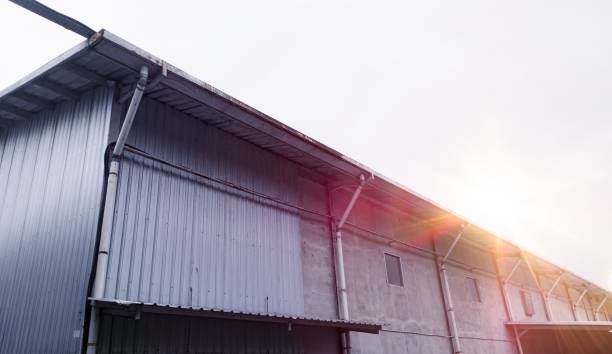 istock Industrial building with steel roof construction 1962563987