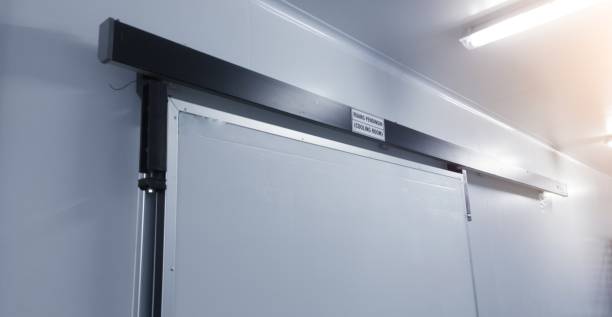 istock Modern interior sliding door on the industrial room corridor. 1962564574