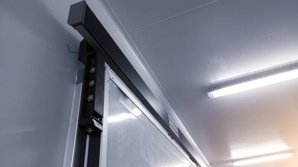 istock Modern interior sliding door on the industrial room corridor. 1962564599