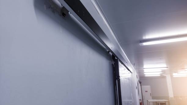 istock Modern interior sliding door on the industrial room corridor. 1962565719