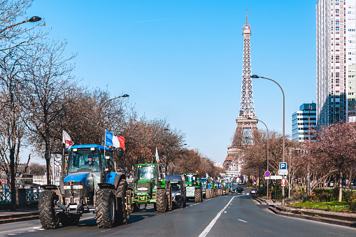 French farmers demonstrating with tractors, in Paris, Beaugrenelle quarter, February 8, 2023.
