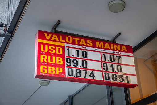 Picture of the exchange rate board of a latvian exchange office with the rates for Euro to US Dollar, British Pound and Russian Rubble in Riga, latvia.