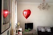 Red heart shaped ballon . Surprise for Valentine's Day
