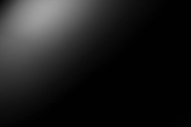 istock Dark black and gray blurred gradient background has a little abstract light. 1962612181