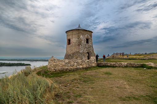 One of the towers of the ancient fortress of the ancient Bulgarian Yelabuga settlement and view of the city in the Republic of Tatarstan, Russia. High quality photo