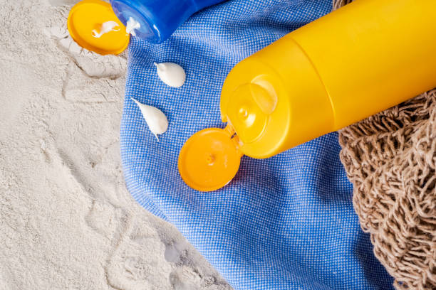 Woman applying sunblock protection