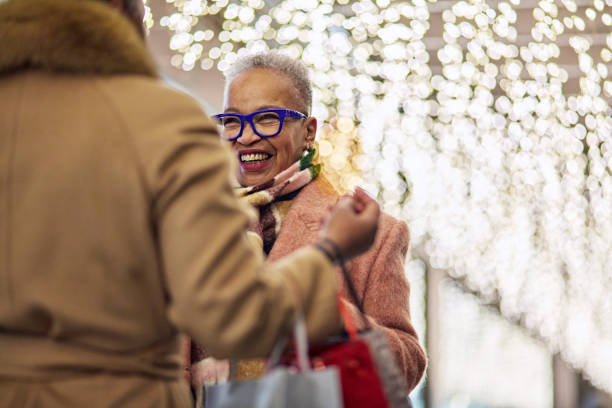 istock Shoppers meeting up during Christmas season 1962673430
