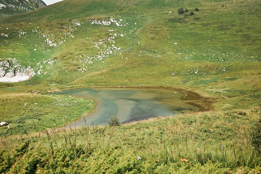 Psenodakh mountain lake in the Caucasus mountains. The natural landscape. The high-altitude area of the Caucasian Nature Reserve