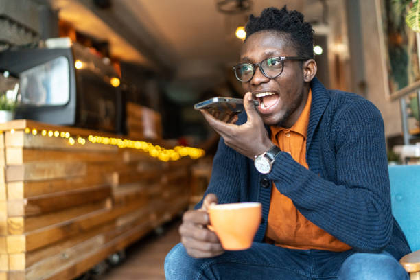istock Cheerful young man having phone call 1962694288
