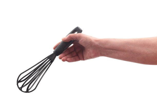 Woman holding and  Wire whisk