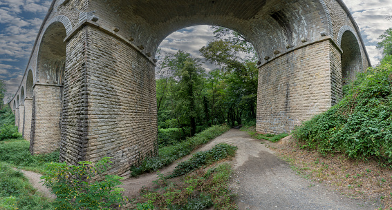 View of a railway bridge from the bottom of the forest