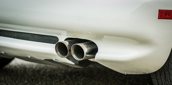Exhaust tips on a white car