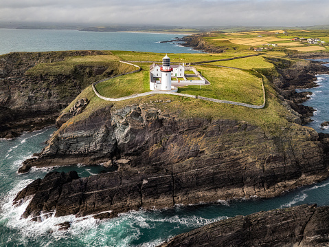 Galley Head Lighthouse is located in County Cork, Ireland. It is situated on the Galley Head peninsula, overlooking the Celtic Sea. The lighthouse was built in 1875 and stands at an elevation of 53 meters