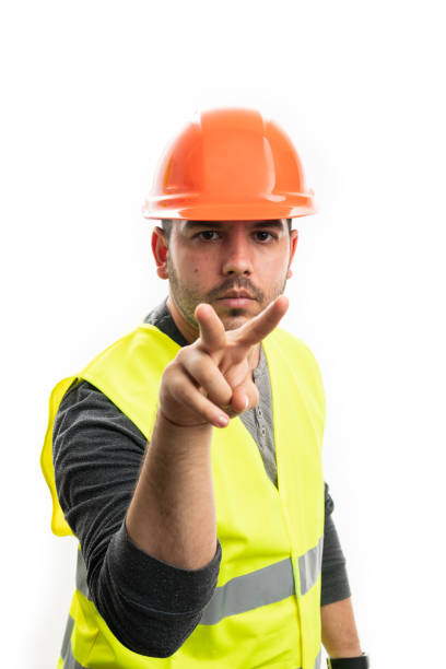 istock Supervisor builder making eyes on you gesture with fingers 1962803186