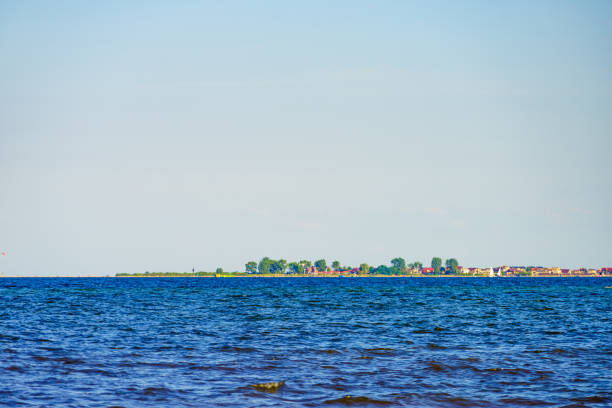 Seascape. Baltic Sea, Puck Bay with Rewa village on horizin, Poland. Nature landscape.