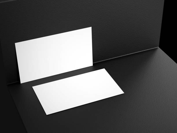 istock Stationery concept with blank business card on dark background 1962810063