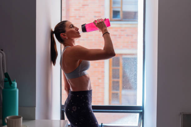 istock Latin woman at home is exercising 1962819109