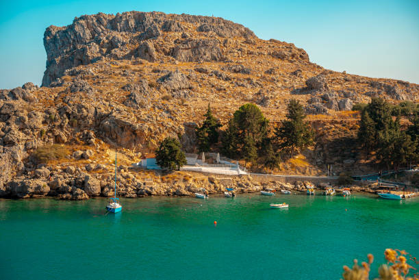 High cliffs in St. Paul's Bay in Rhodes in Greece.