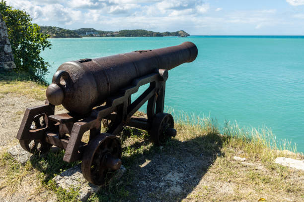 An ancient cannon pointed toward the harbor at Fort James on the island of Antigua in the Caribbean.