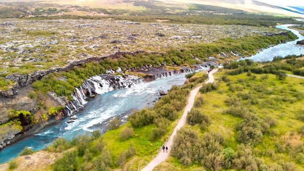 Aerial view of Beautiful blue river and rock formations at Barnafoss waterfalls in Western Iceland Aerial view of Beautiful blue river and rock formations at Barnafoss waterfalls in Western Iceland. hraunfossar stock pictures, royalty-free photos & images