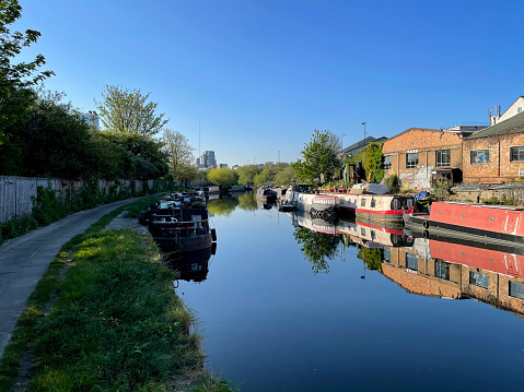 House boats on the River Lea in and industrial district in Hackney Wick, east London