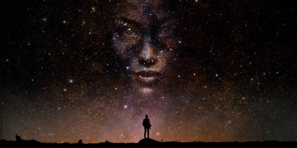 person in silhouette schaut auf göttliches gesicht in sternen - divine inspiration stock-fotos und bilder