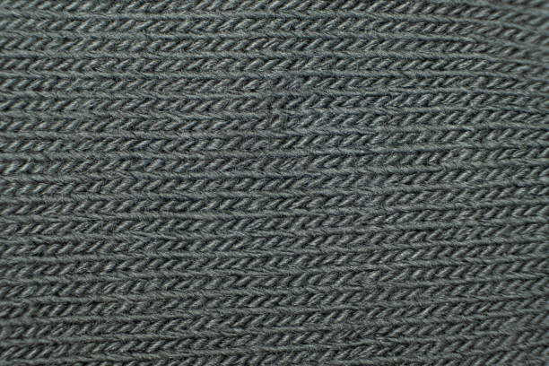 Pattern and texture of synthetic acrylic fabric close-up macro