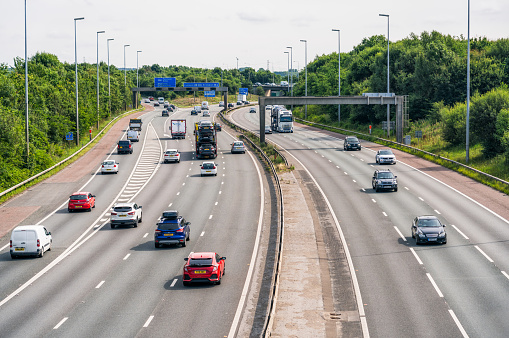 Looking south at traffic on the M6 Motorway near Preston, on a busy afternoon in August.