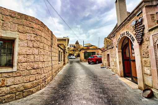 Cappadocia,Turkey , October 5, 2019 - Cobble stoned streets of charming Göreme, a UNESCO world heritage site and town in Nevsehir Province, Cappadocia Region,Turkey.