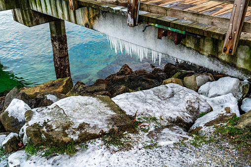 Icicles hang from a pier in Ruston, Washington.