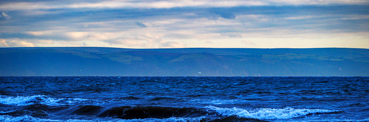 gower peninsula wales uk cliffs sea ocean rocky coastline landscape scenery