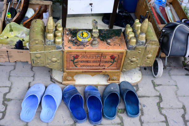 Close-up of traditional shoe shiner with his toolbox and equipment in the streets of old Istanbul. Istanbul, Turkey 01-26-2024.