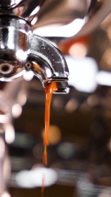 Close-Up of a Portafilter Pouring Fresh Espresso