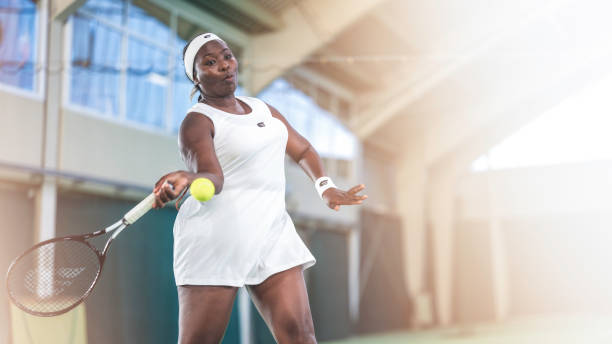 istock Tennis player hitting ball with racket 1963010133