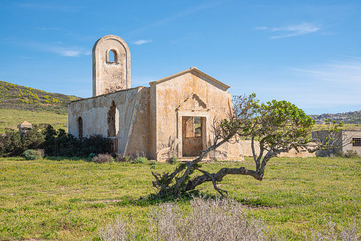 Ancient country church with sky and vegetation on the island of Asinara, Sardinia