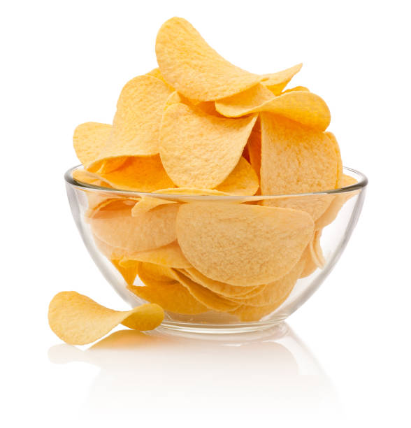 istock Potato chips in glass bowl isolated isolated on white background 1963070461