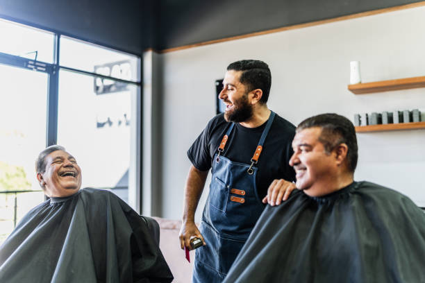 istock Barber talking to customers at barber shop 1963073687