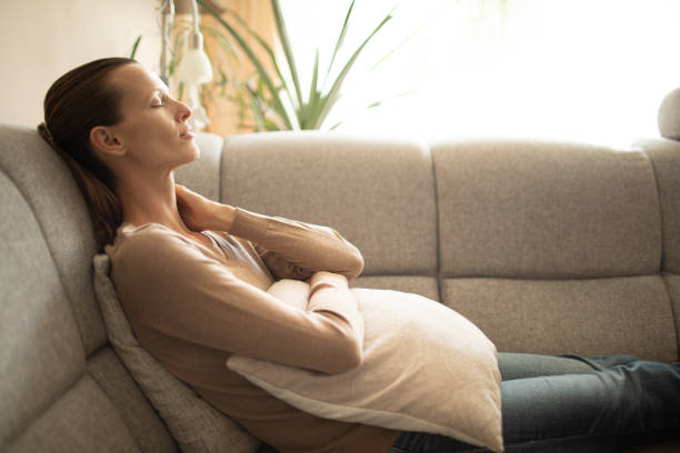 istock Woman relaxing on the sofa. 1963078941