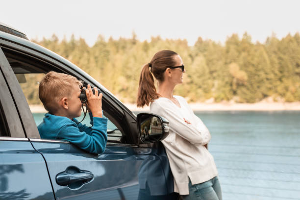istock Mother and son enjoying beautiful view. Road trip. 1963082055