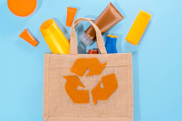 Plastic recycling sign Used cosmetic tubes and beauty products. Buy and consume less cosmetic. Save the planet sorter machine stock pictures, royalty-free photos & images