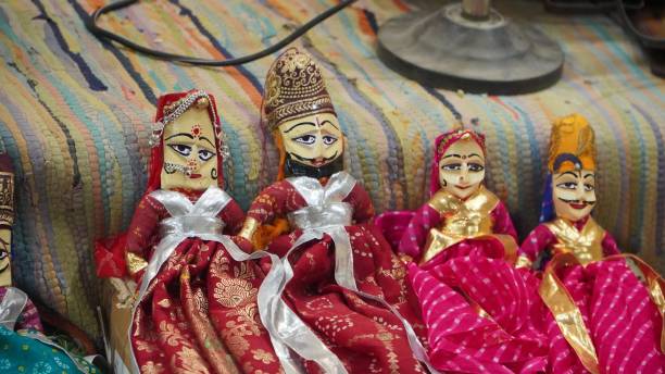 istock rajasthani puppet couple cute dolls 1963116843