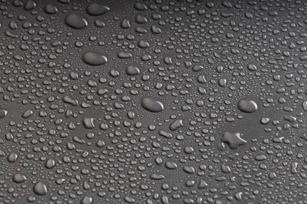 istock water droplets on a gray surface, a lot of drops randomly arranged on plastic 1963123620