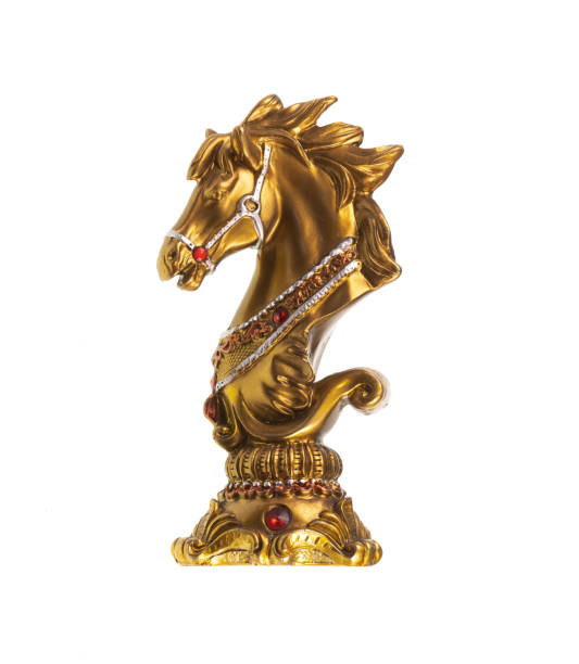 istock golden figured chess knight isolated on white background 1963142157