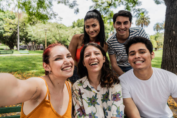 istock Friends taking a selfie outdoors - camera point of view 1963213585