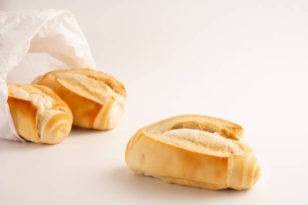 istock Fresh baked flour bread in paper bag in clean background in front view angle with empty blank space 1963268017